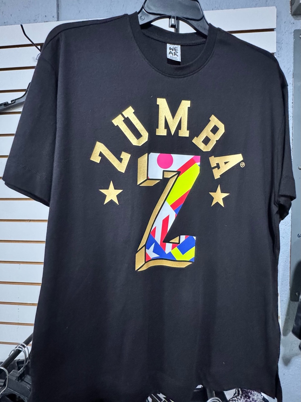 Zumba Fitness Black Tee with Gold Lettering and Multicolor 'Z'
